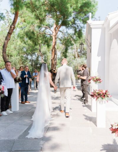 Elegant boho wedding floral decoration at Agia Filothei church in burgundy tones