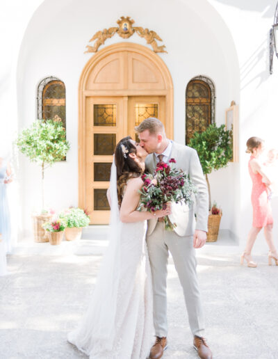 Elegant boho wedding floral decoration at Agia Filothei church in burgundy tones