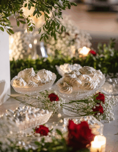 Luxury wedding dessert table with meringues and almonds