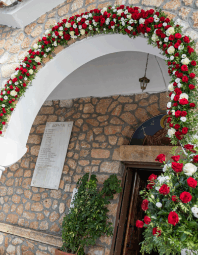 Luxury big arch with wedding floral decoration at Agia Marina Ekali church