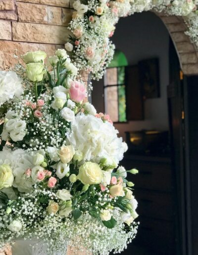 Wedding ceremony floral styling at the chapel of Filoxenia Estate